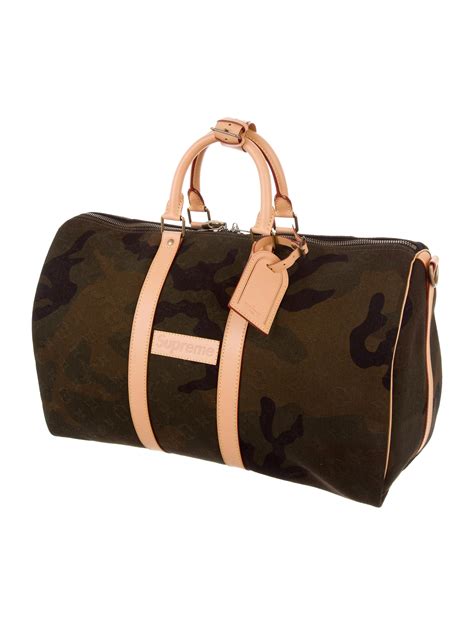 supreme louis vuitton camo duffle bag|supreme x louis vuitton collection.